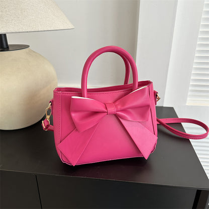 Elegante quadratische Handtasche mit XXL-Schleife