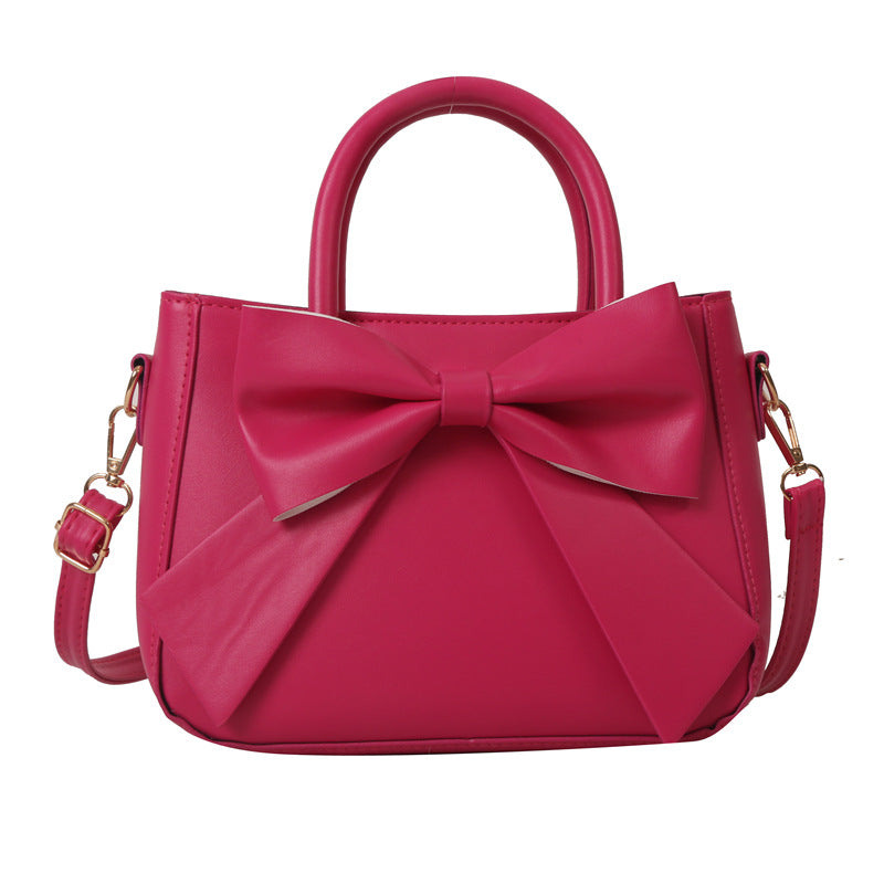 Elegante quadratische Handtasche mit XXL-Schleife